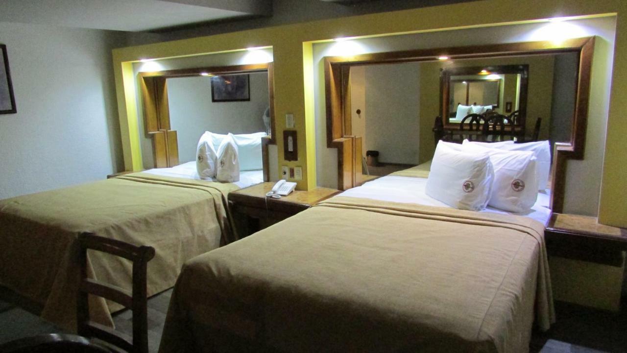 Habitación con 2 camas grandes